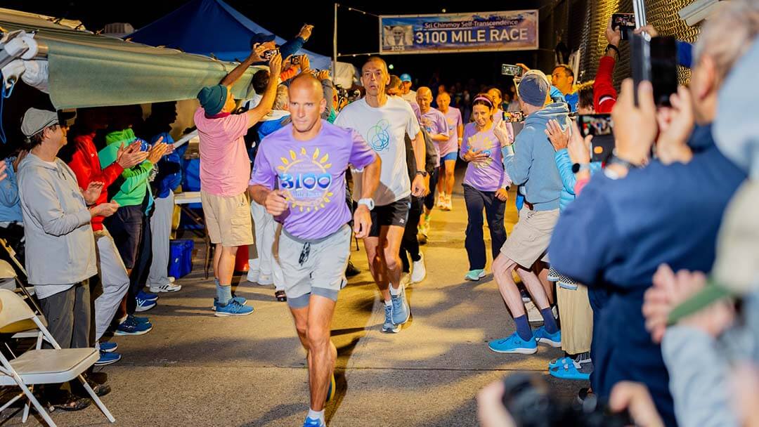 Participants starting the 3100 Mile Race around Thomas A. Edison High School, Queens